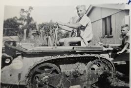 Charles on the tractor pulling the trough Charles on the tractor pulling the trough