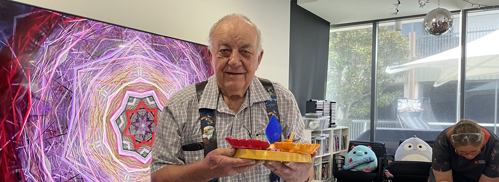 Ian showcasing his handmade crystals.jpg Ian showcasing his handmade crystals.jpg