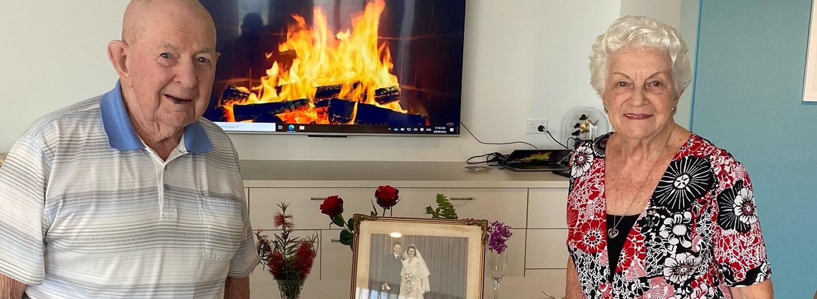 Celebrating their wedding anniversary together Celebrating their wedding anniversary together