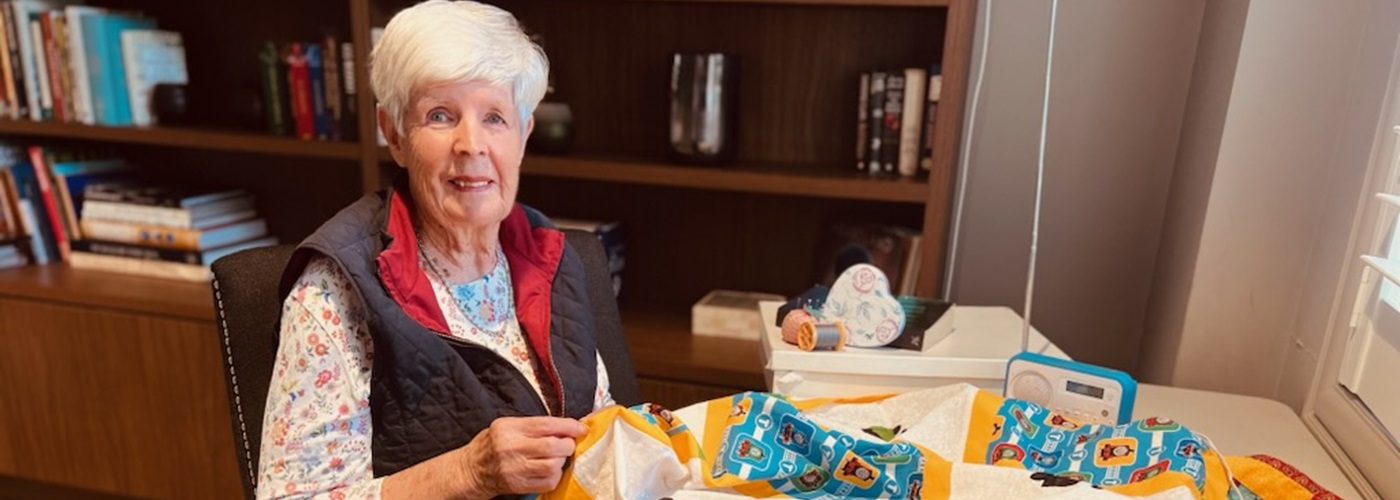 Wendy with her quilting project.jpg