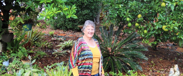 Wendy in her garden at Bongaree